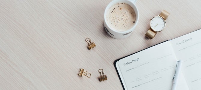 New Year's Goals3 goal calendar with a cup of coffee